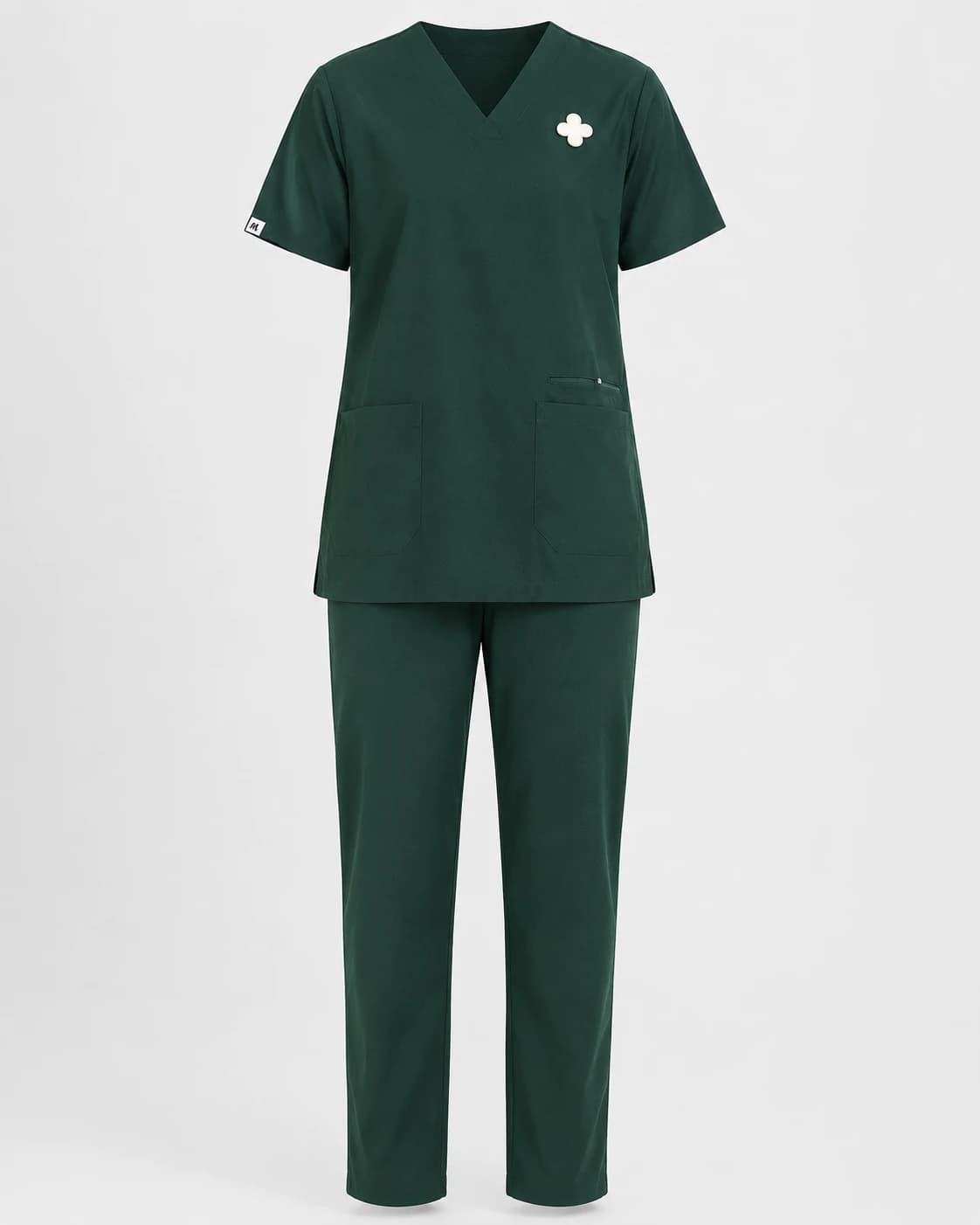 KBwear bottle green V-neck scrub set with a zipped lower pocket and woven sleeve label