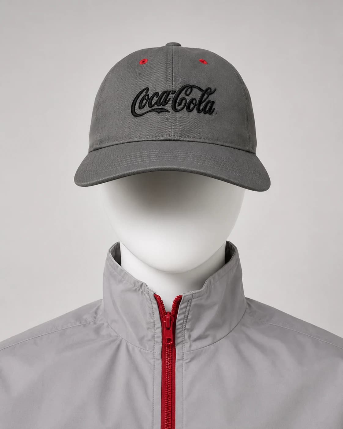 Coca-Cola grey twill cap with 3D black embroidered logo and red eyelets, by KBwear