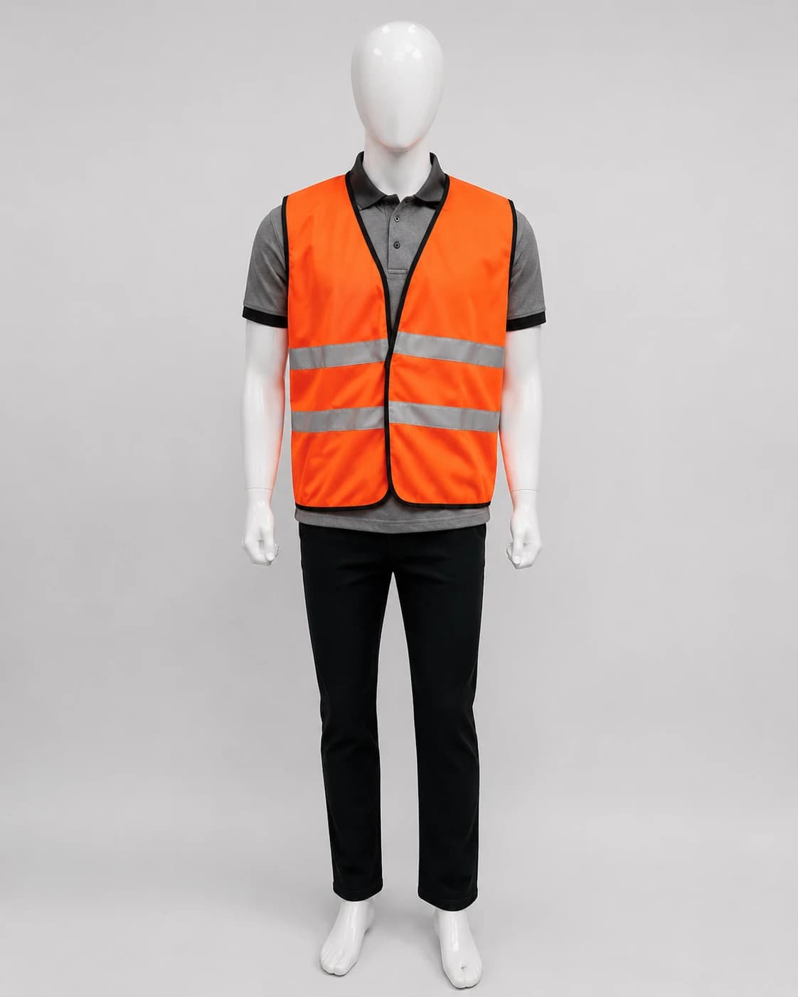 Orange high-visibility safety vest with dual reflective bands worn over grey polo, by KBwear